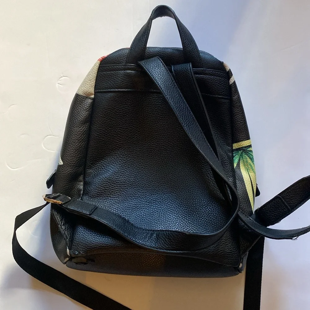 Desigual tropical‎ backpack. See pictures for condition. As is.